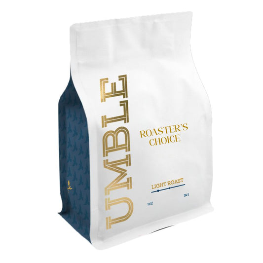 Umble coffee bag with gold and blue text on a white background